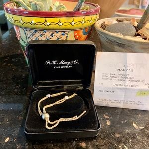 Macy’s 14k two-toned gold beaded bolo bracelet